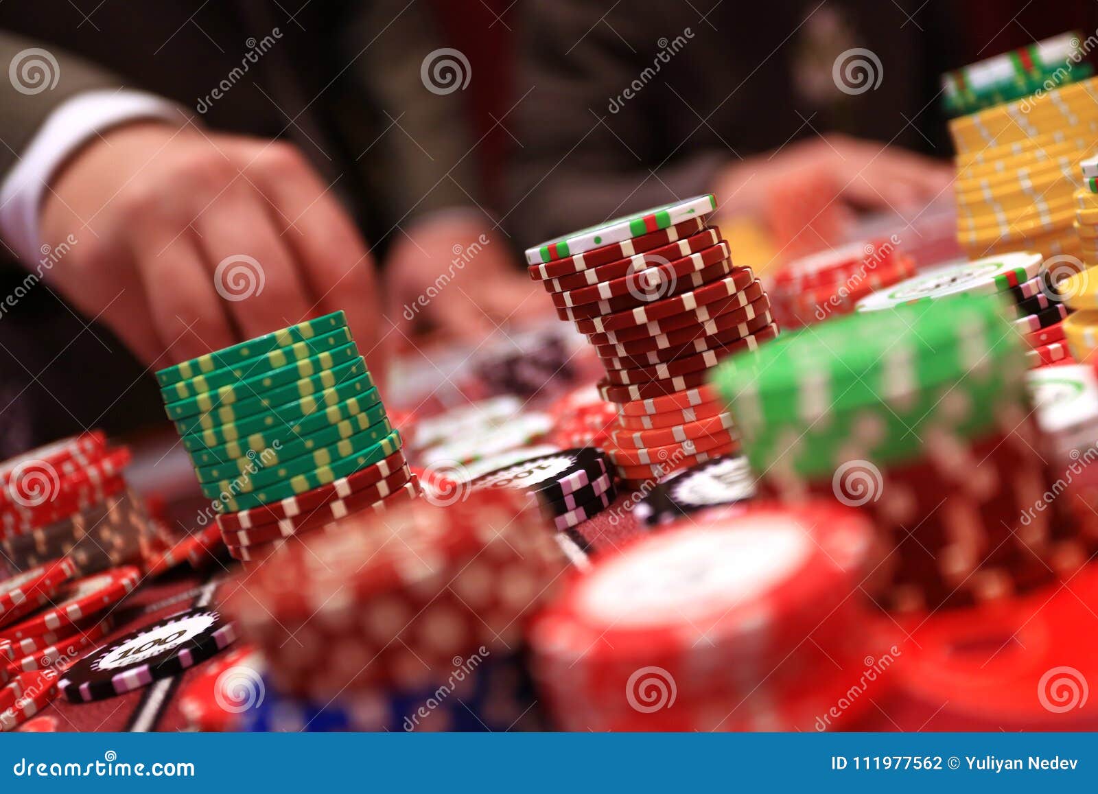 Player Placing Chips on a Gambling Table in Casino Stock Photo Image
