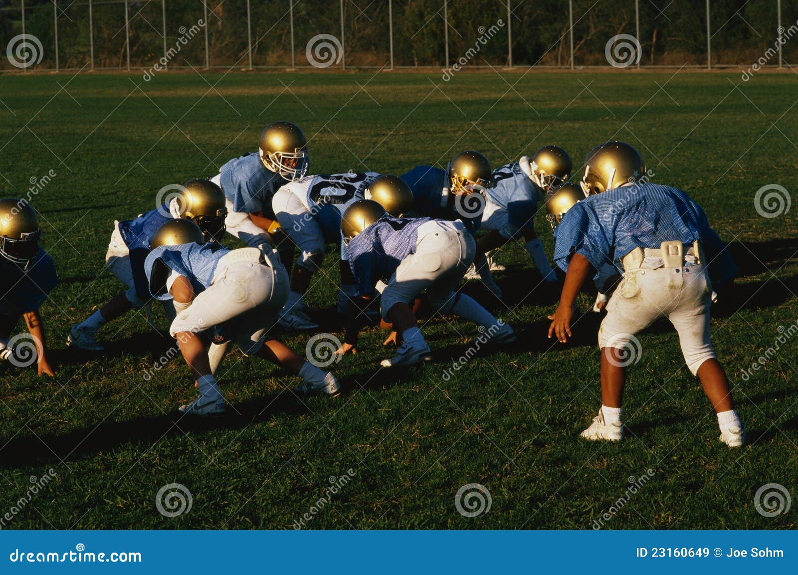 Players in a junior league editorial stock image. Image of football