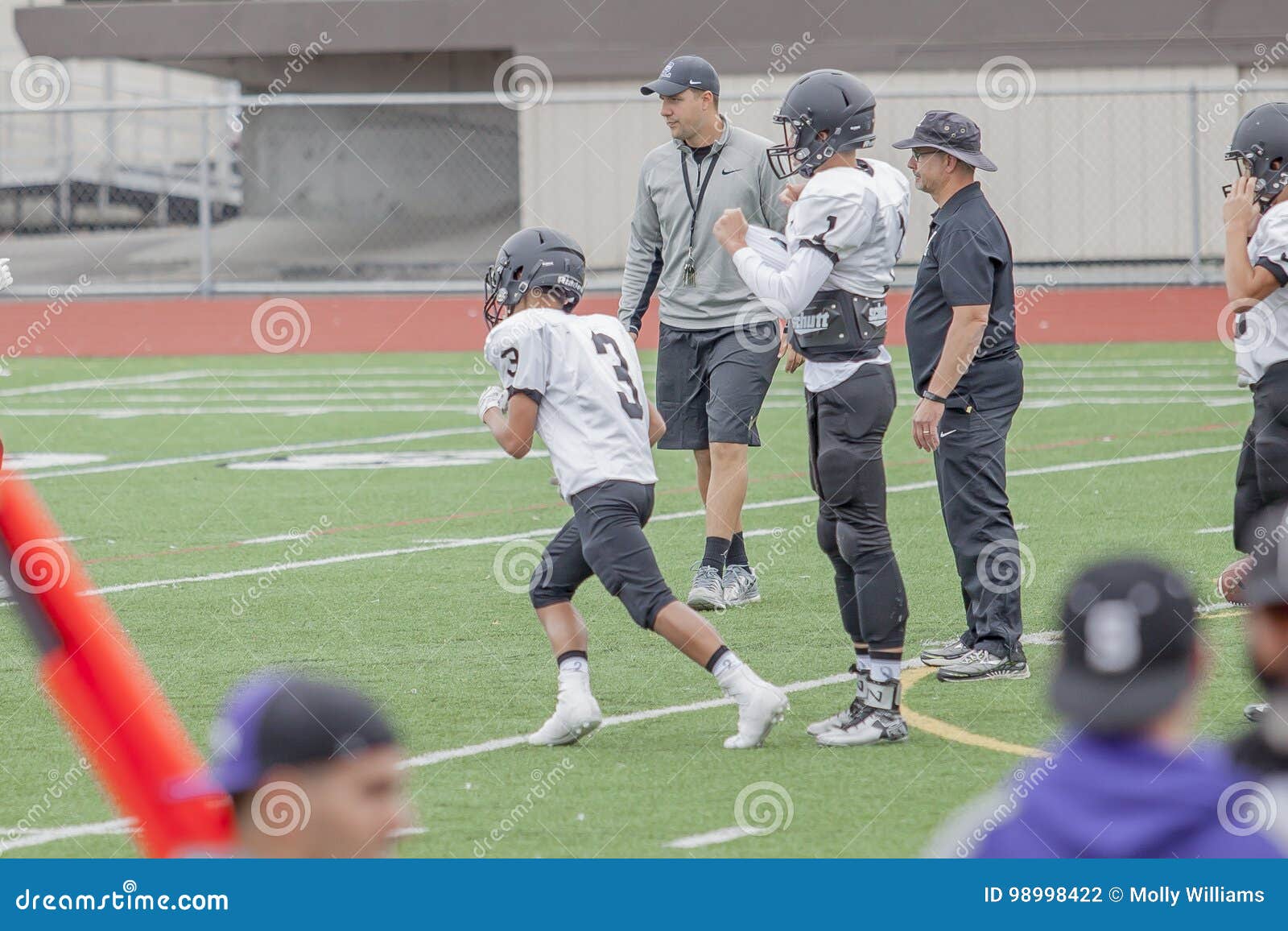 High School Football Training Stock Photo Image of schooling, helmets 98998422