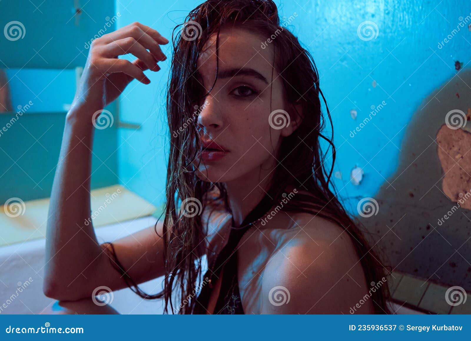 Playful Brunette Posing In A Bathtub Wearing Underwear In The Neon Light Stock Image Image Of