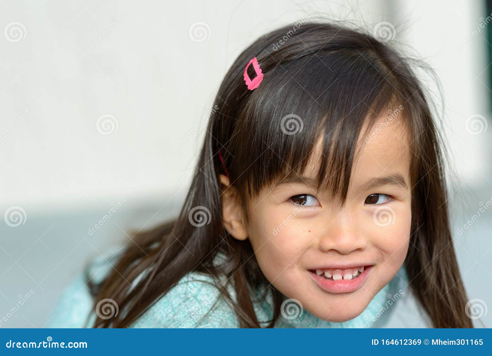 Playful Friendly Little Girl Leaning Forwards Stock Image - Image of ...