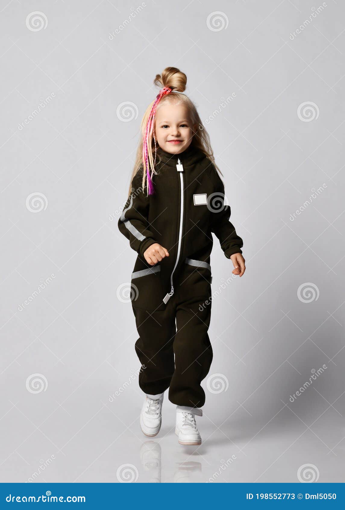 Frolic Blonde Kid Baby Girl with Stylish Hairstyle and Colorful Braids in Brown Jumpsuit Runs Hopping Towards Camera Stock Image - Image of clothing, little: 198552773 Frolic Blonde Kid Baby Girl with Stylish Hairstyle and Colorful Braids in Brown Jumpsuit Runs Hopping Towards Camera Stock Image - Image of clothing, little: 198552773