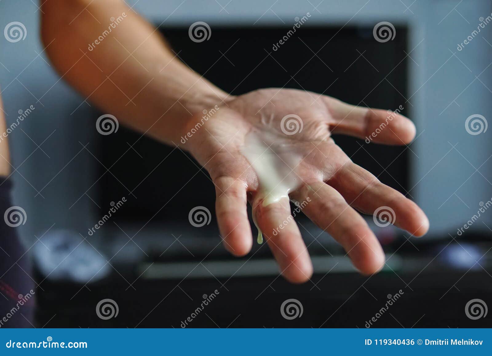 A Playful Male Hand in Panties Lay on Bedroom Stock Photo - Image