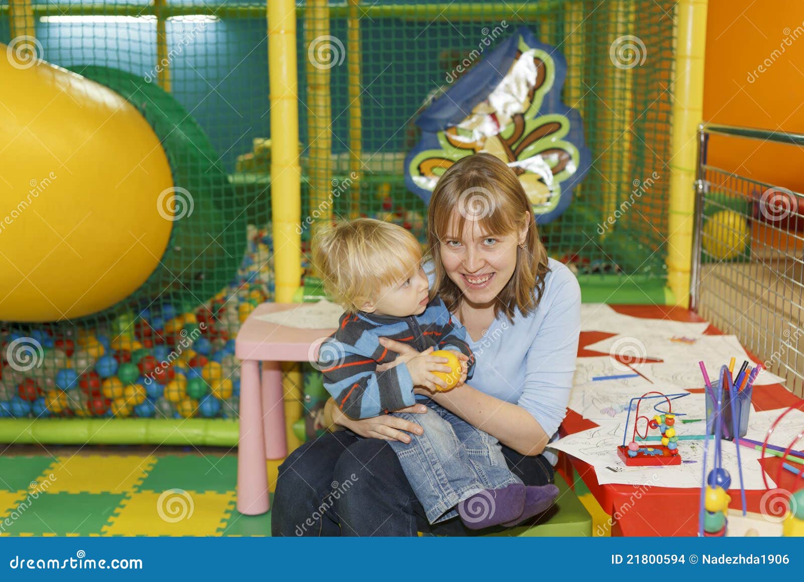 Playground assistant stock photo. Image of helping, interacting 21800594