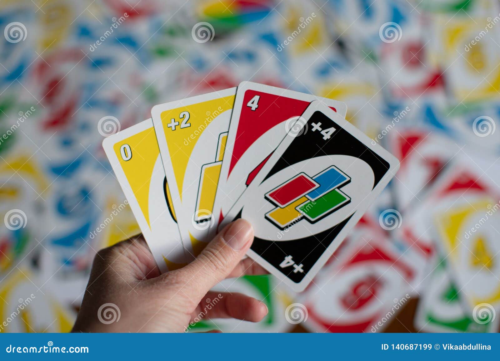 Playing American Card Game Uno, Holding Game Cards in Female Hand