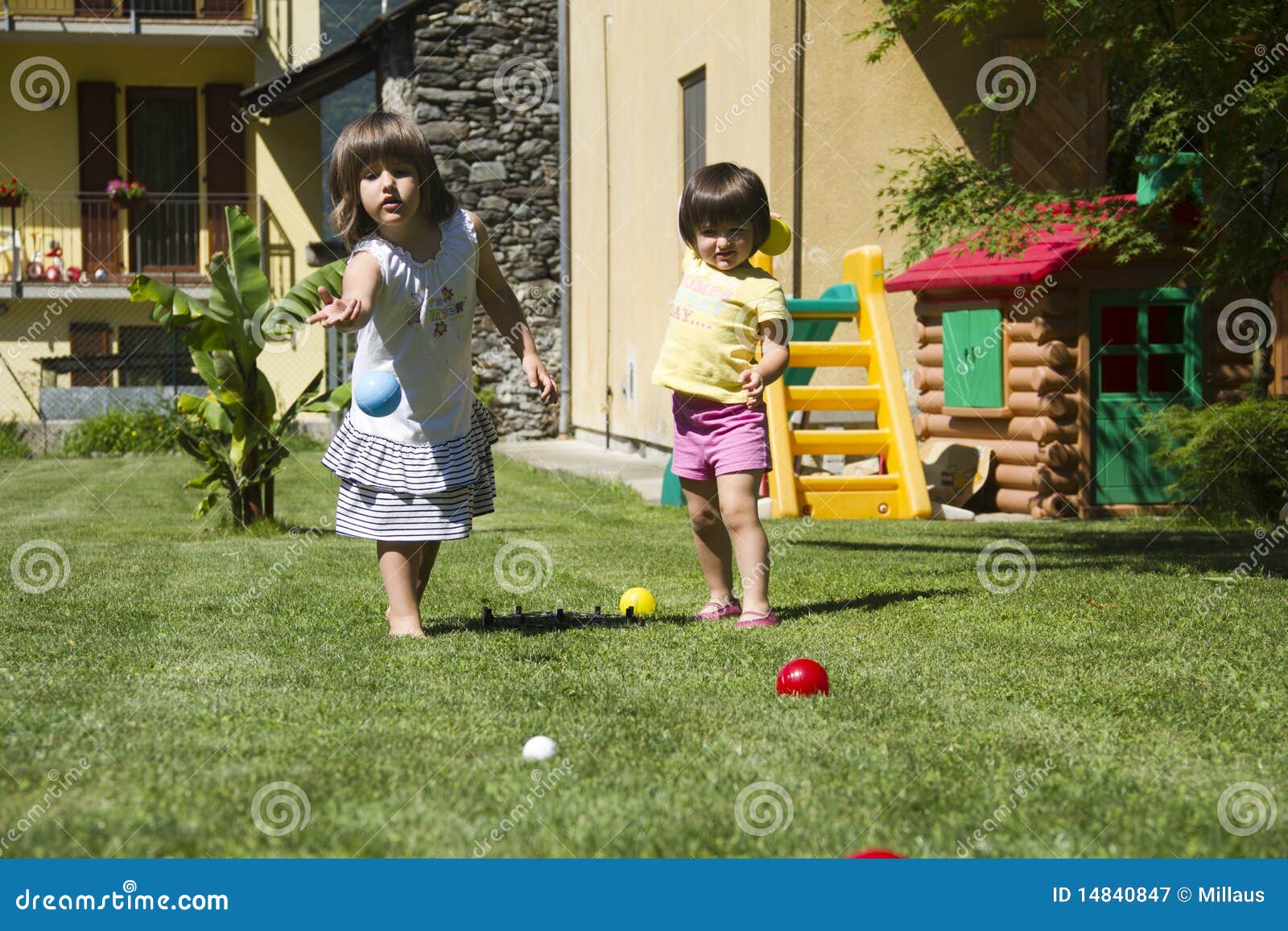 Bocce Ball On The Green Grass RoyaltyFree Stock Photography