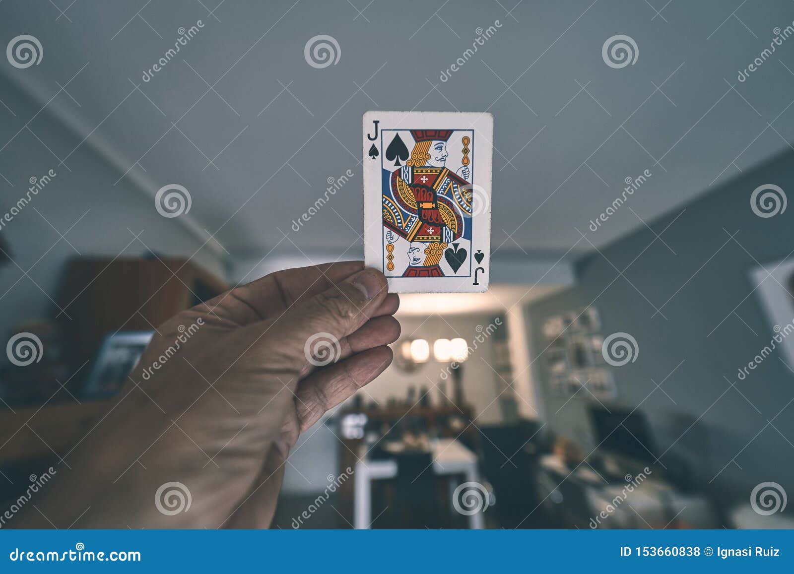 Playing card in a hand. stock photo. Image of male, gambling 153660838