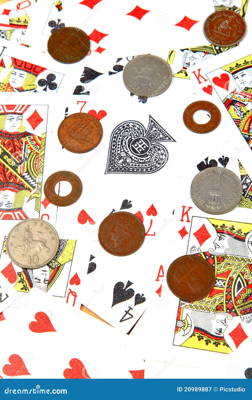 Playing cards and coins stock image. Image of currency 20989887