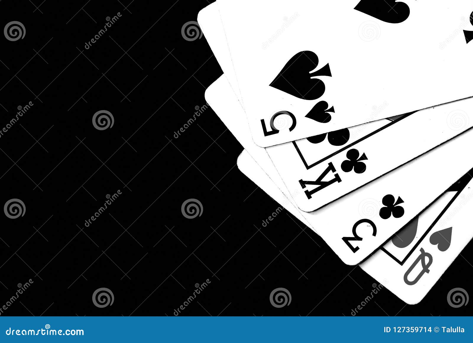 Playing Cards On A Dark Background. Black And White Stock Photo - Image