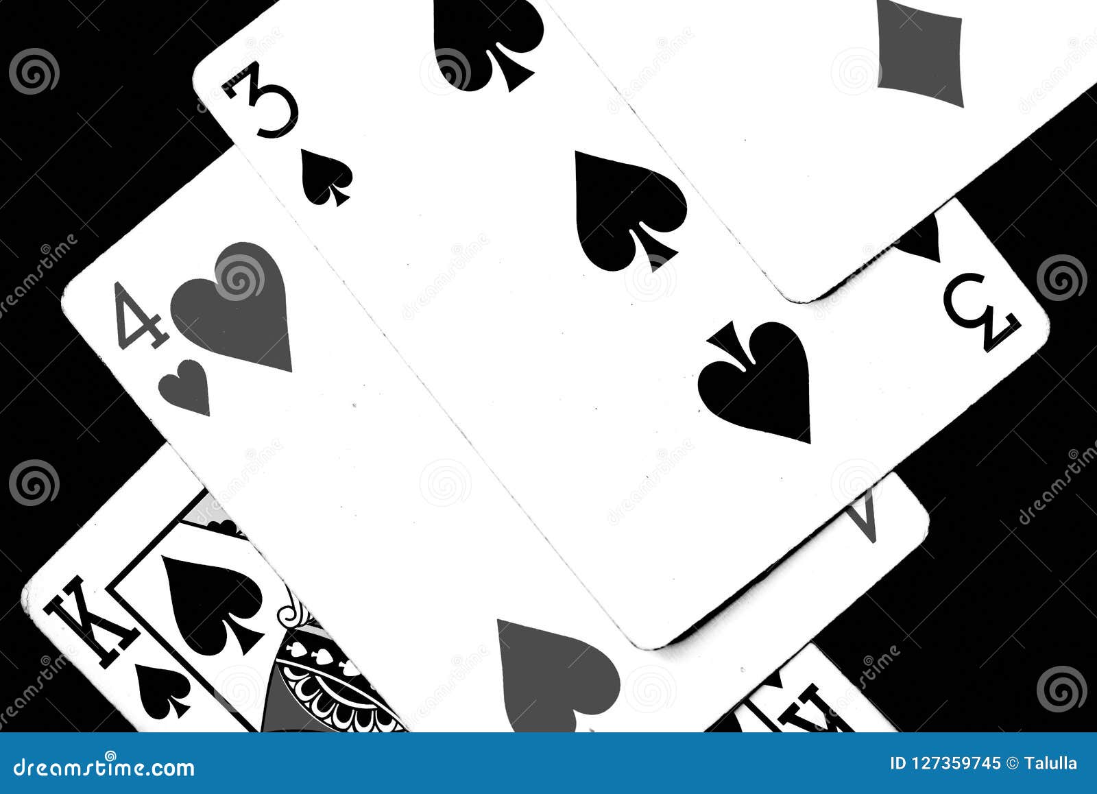 Playing Cards On A Dark Background. Black And White Stock Image - Image