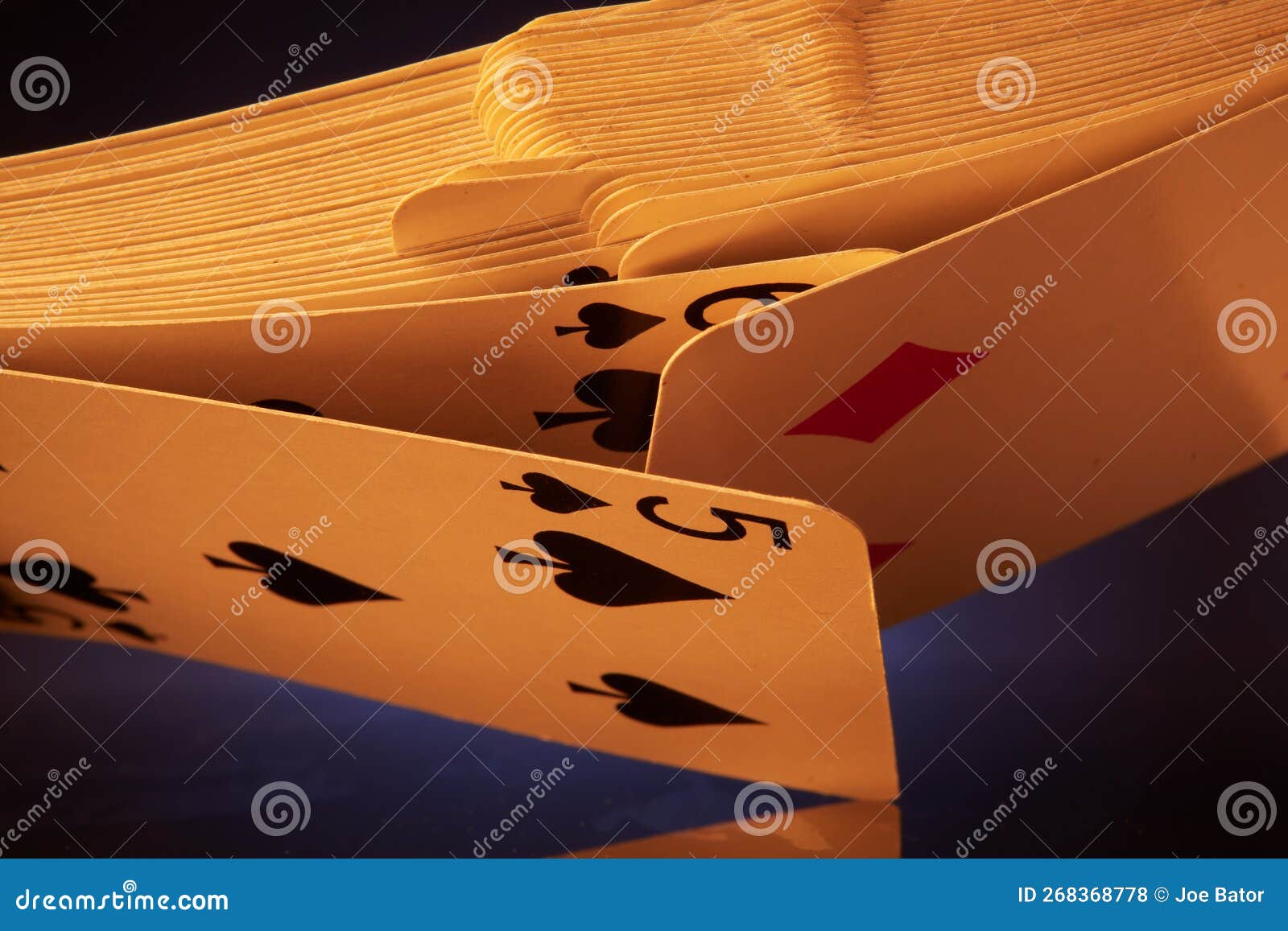 Playing Cards in a Near Perfect Shuffle Stock Photo Image of shuffle