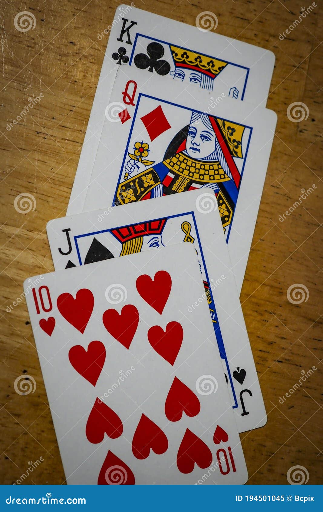Playing cards on a table stock image. Image of table 194501045