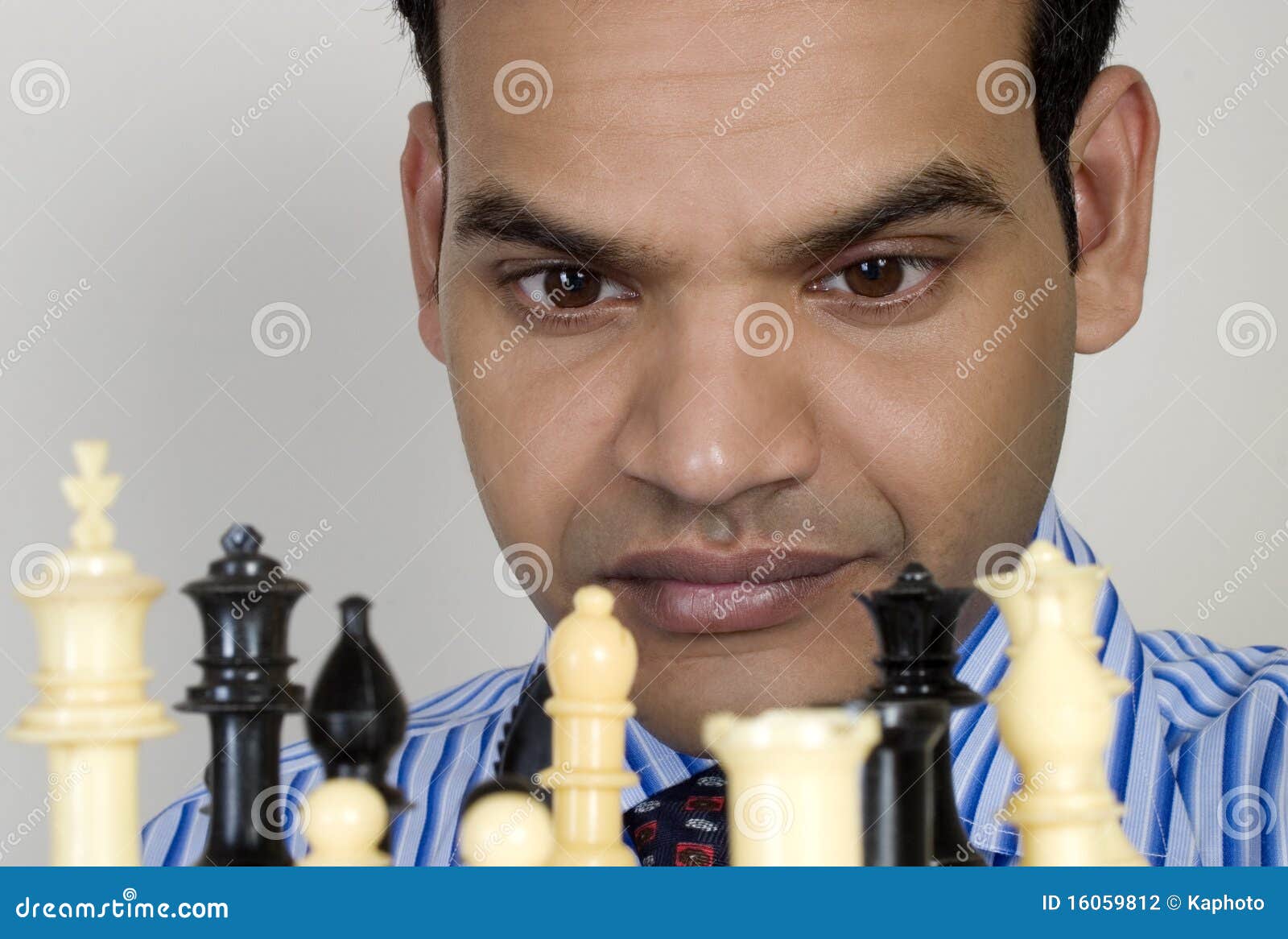 Focused woman thinking about next move and playing chess · Free Stock Photo