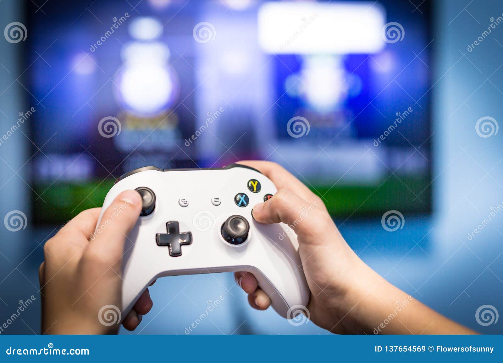 Free Photo  Player winning video games with controller and headset in  front of monitor. man using joystick and headphones, playing online games  on computer. person celebrating game win for leisure.