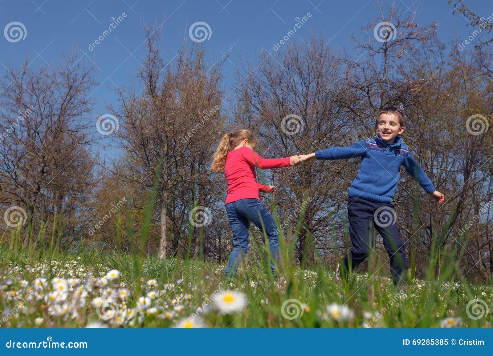 Playing on the grass stock image. Image of playing, park 69285385