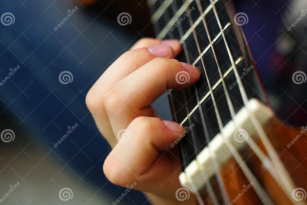 Playing the Guitar Fingers on Guitar Strings Stock Image Image of