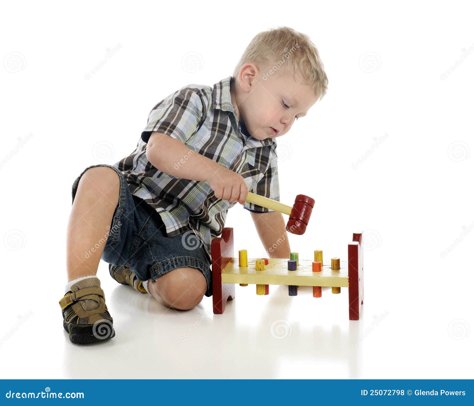 Playing with Hammer Toy stock photo. Image of small, shorts 25072798