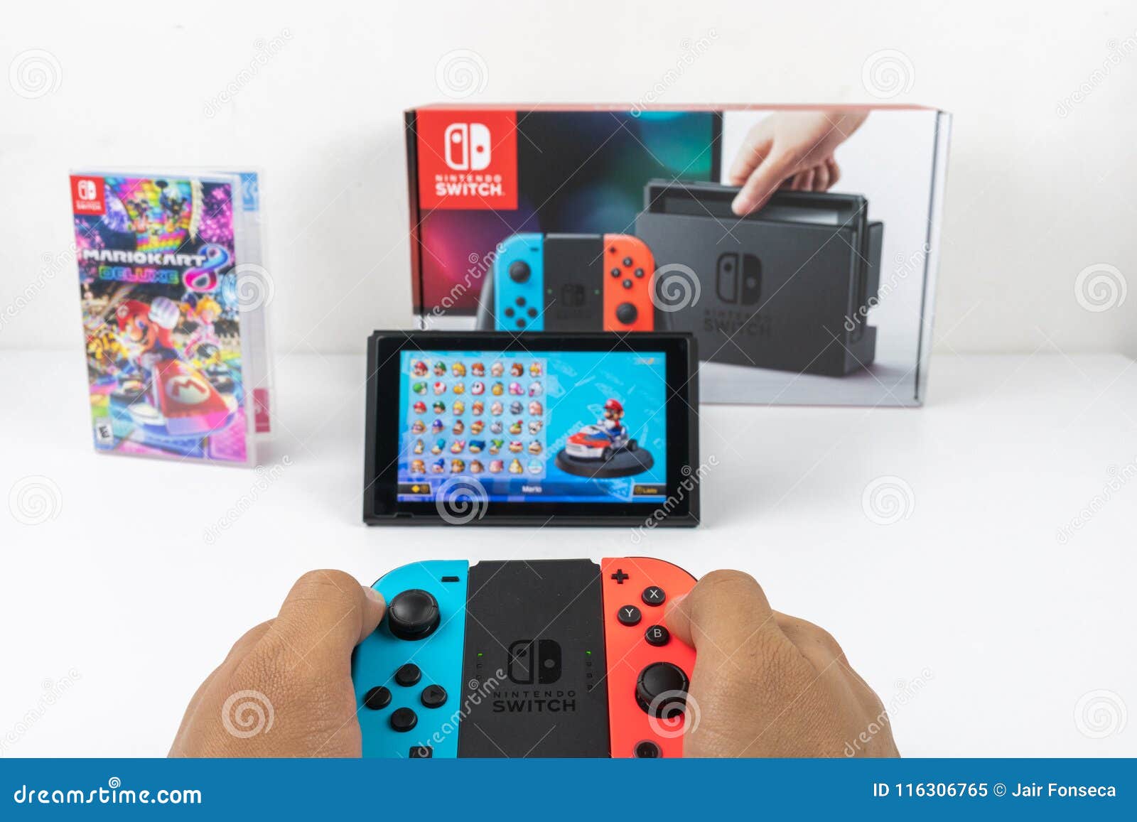 Playing Mario Kart Deluxe 8 in Nintendo Switch Editorial Image Image
