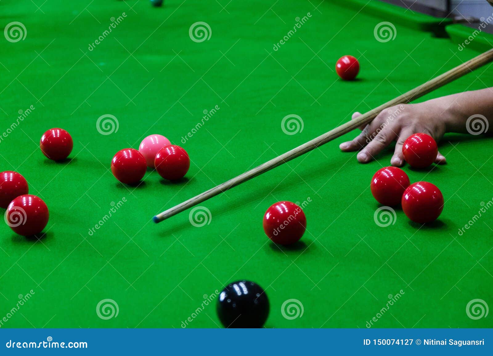 Playing Snooker, Piercing the Red Ball, Black, Aiming the Ball and Pocketing the Hole To Score Points Stock Image