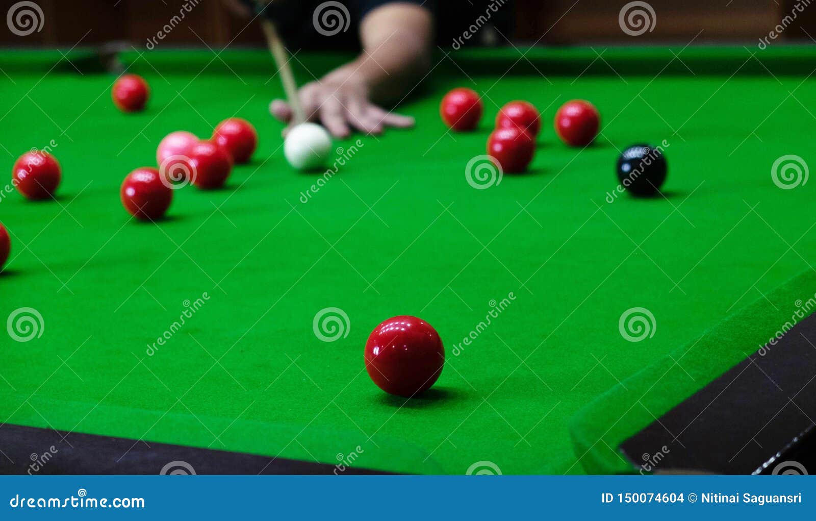 Playing Snooker, Piercing the Red Ball, Black, Aiming the Ball and Pocketing the Hole To Score Points Stock Photo