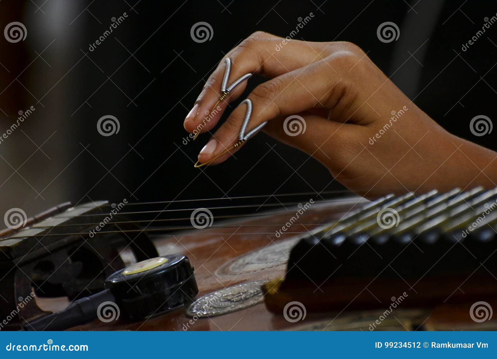 Playing the Veena stock photo. Image of background, fingers 99234512