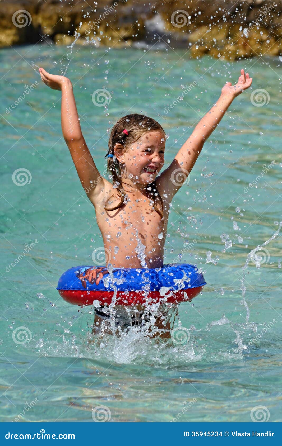 Playing in the water stock photo. Image of people, travel 35945234