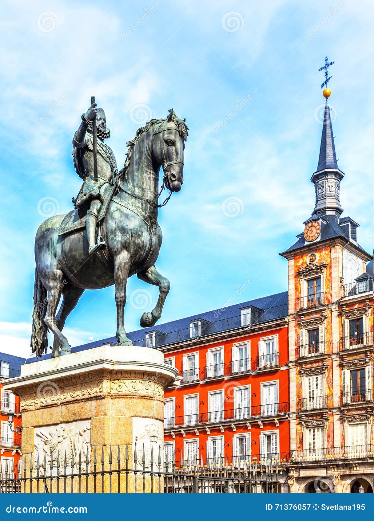 plaza mayor with statue of king philips iii in madrid, spain.