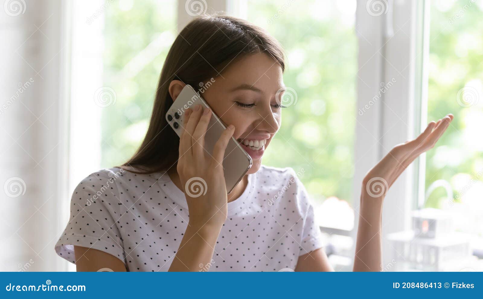 Side View Pleasant Millennial Mixed Race Woman Holding Smartphone