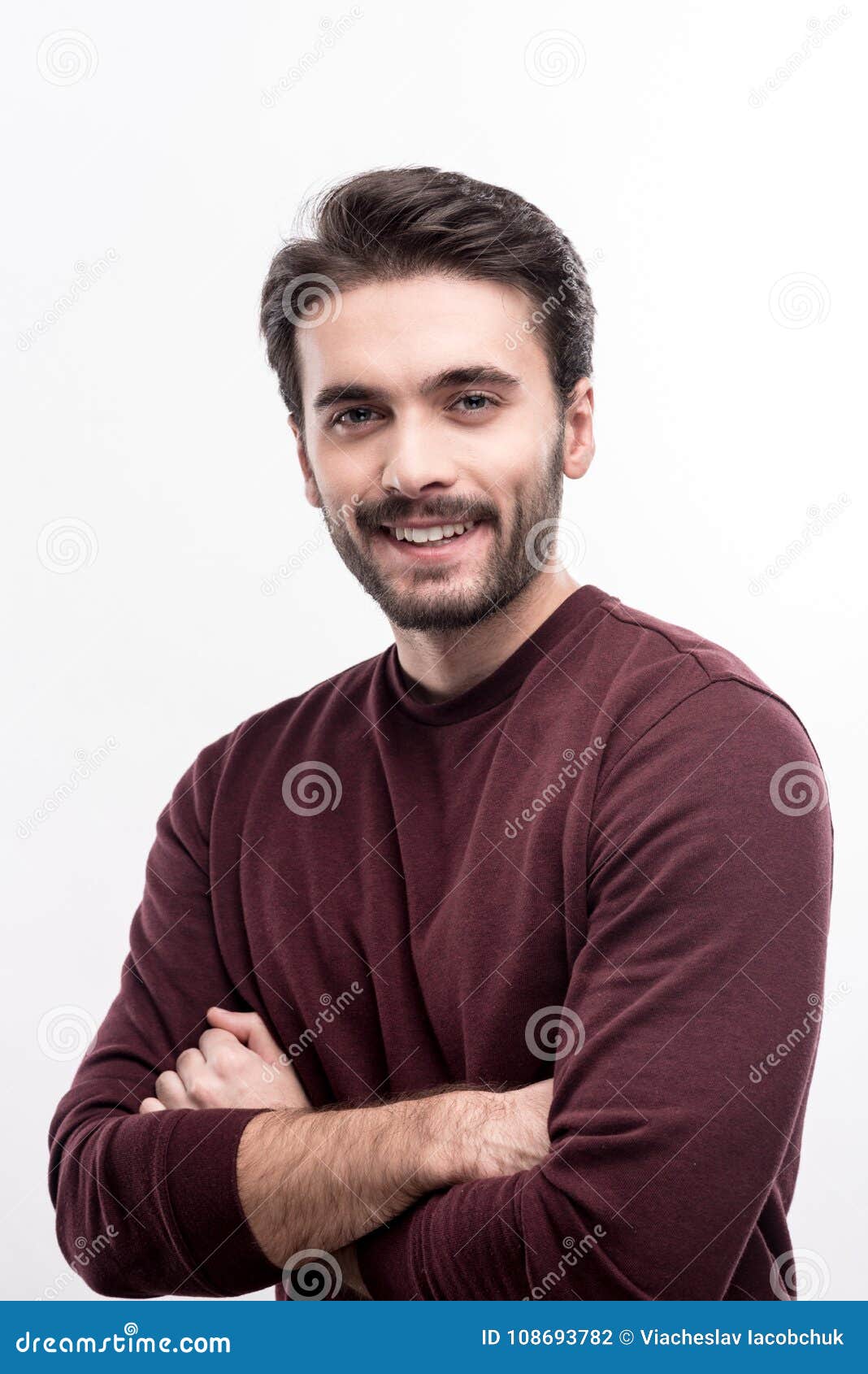 Pleasant Handsome Man Folding Arms Across His Chest Stock Photo - Image ...