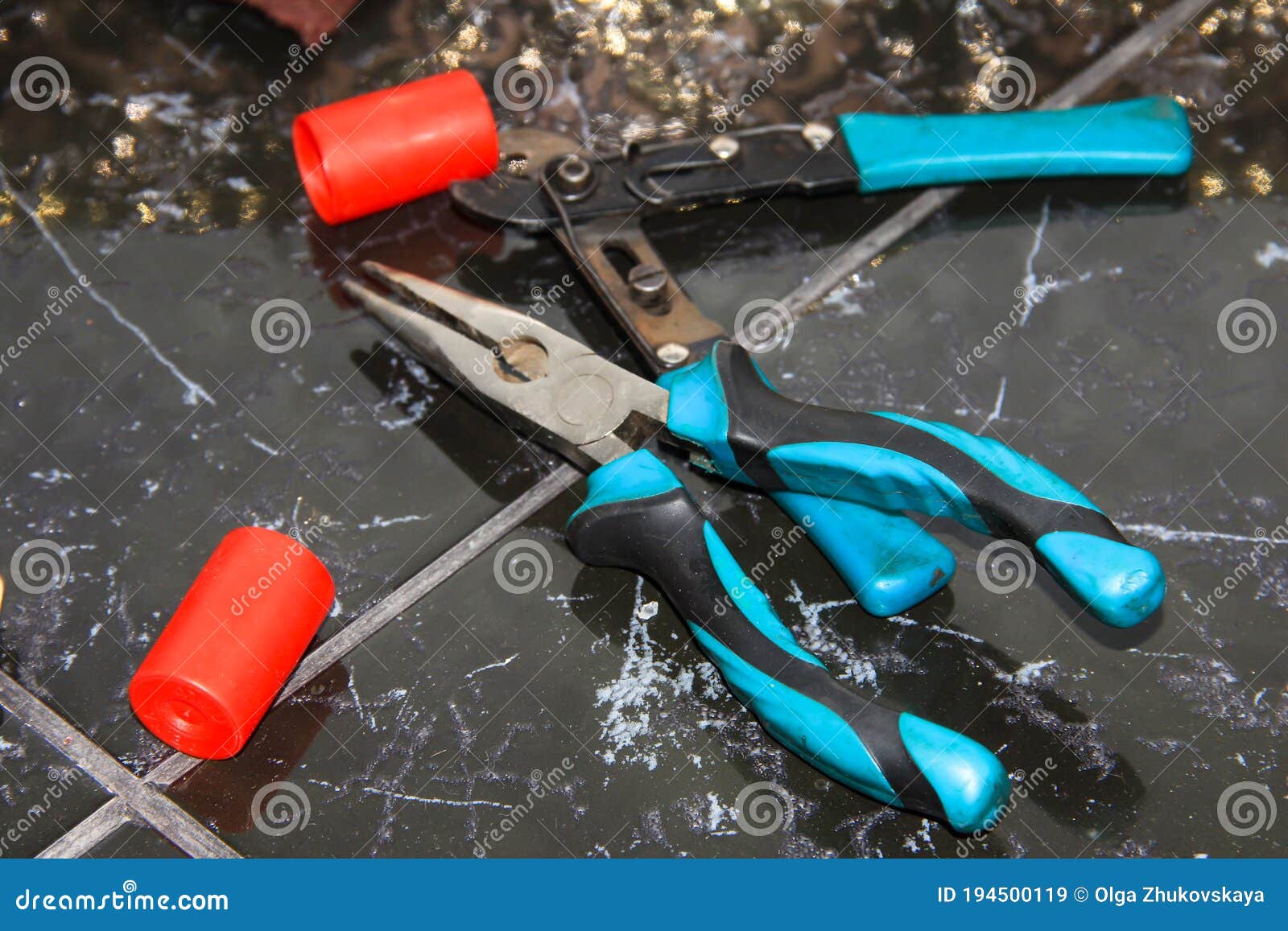 Pliers are Blue on the Black Floor. Tools Stock Image Image of black
