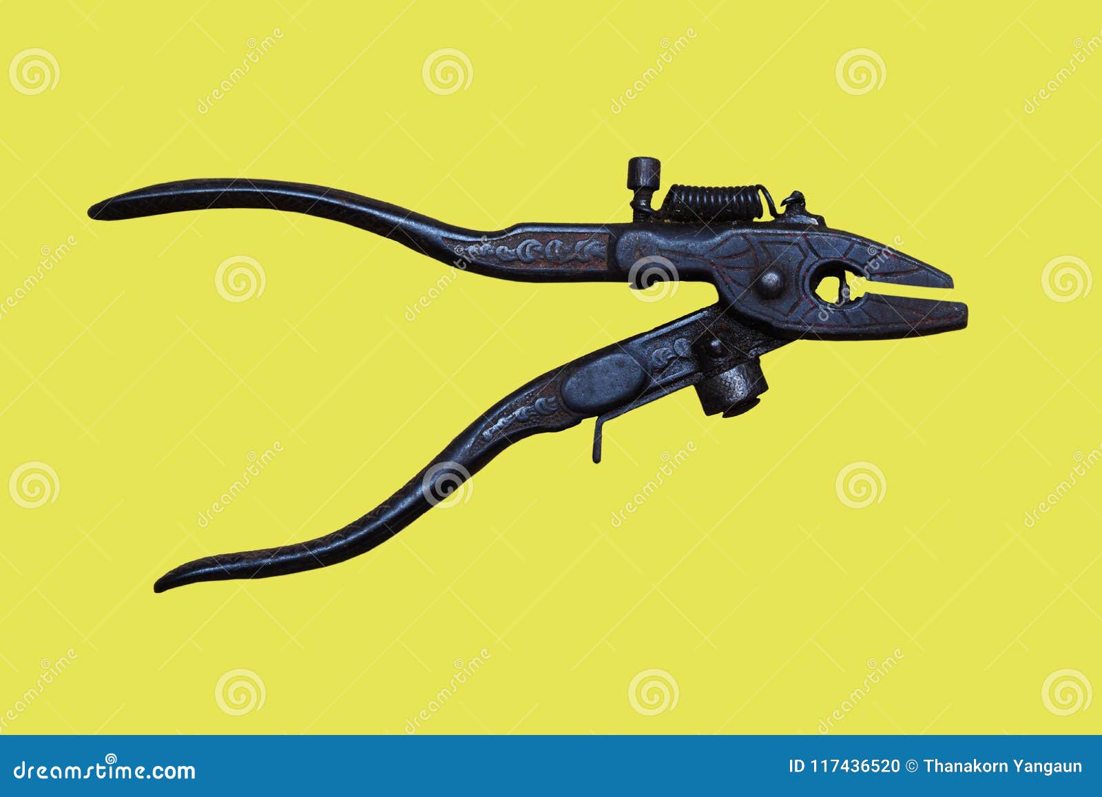 close up pliers locker  on yellow background,hand tool for carpenters working.