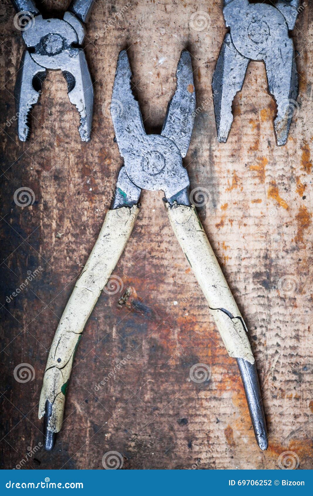 Pliers on wooden plank stock photo. Image of manual, repair 69706252