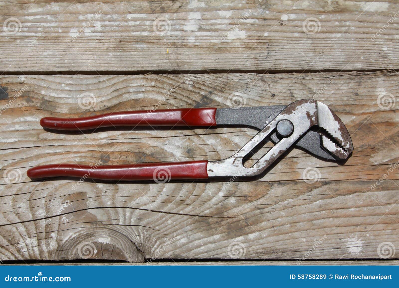 Pliers on wooden table stock image. Image of work, pliers 58758289