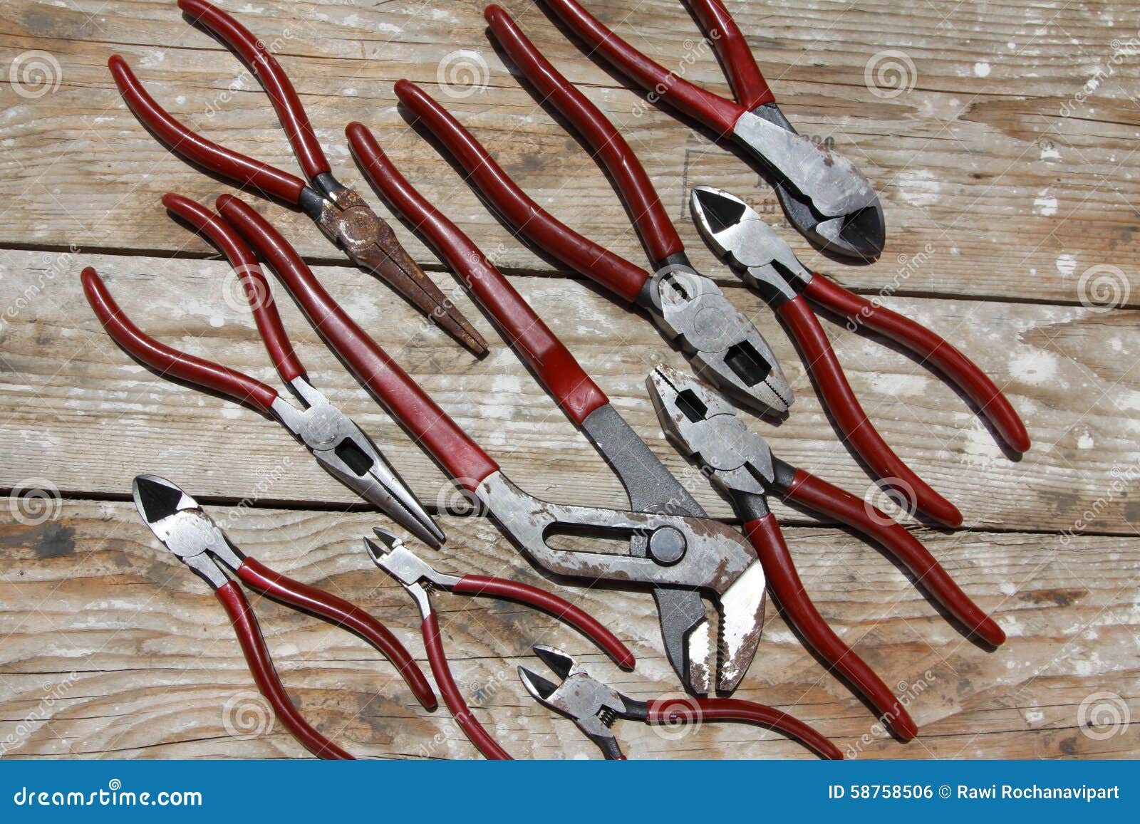 Pliers on wooden table stock photo. Image of manual, tighten 58758506