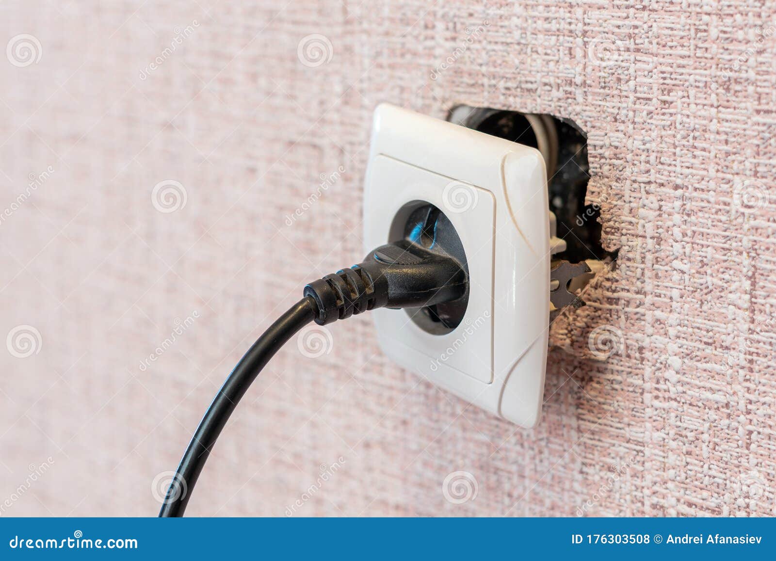 Plug in a Broken Outlet, Risk of Electric Shock Stock Photo Image of