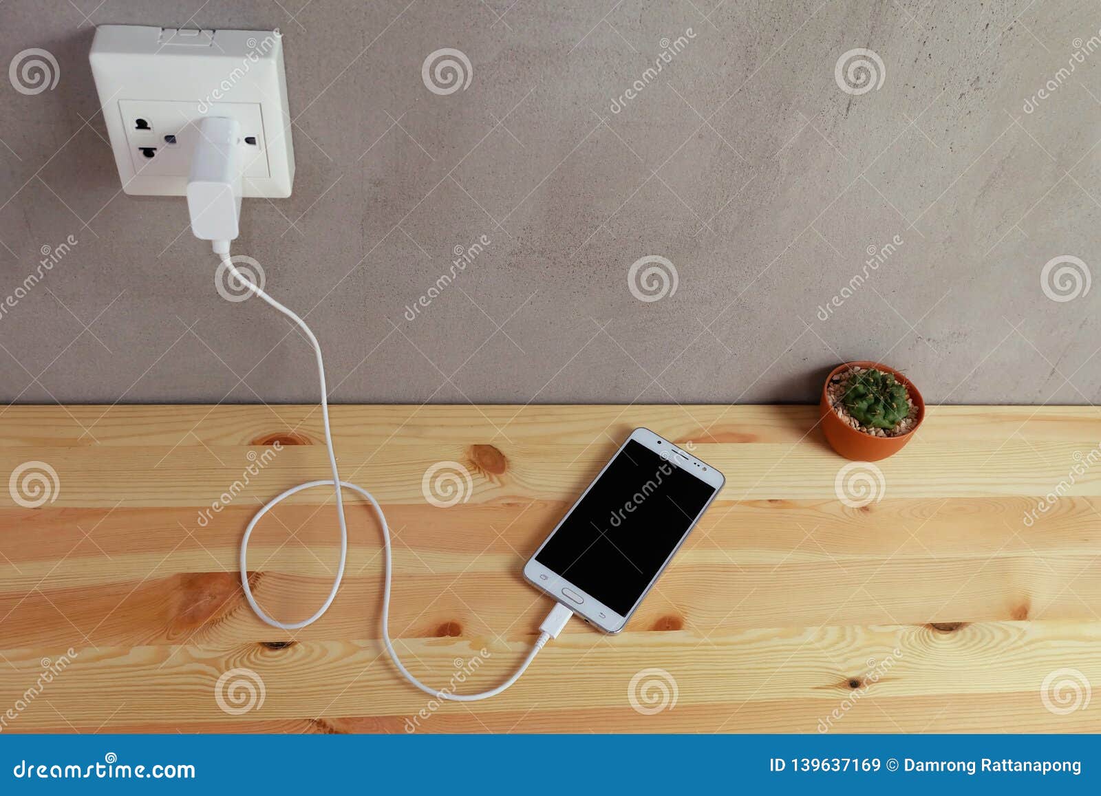 Plug in Power Outlet Adapter Cord Charger of Mobile Phone on Wooden Stock  Image - Image of connect, gadgets: 139637169
