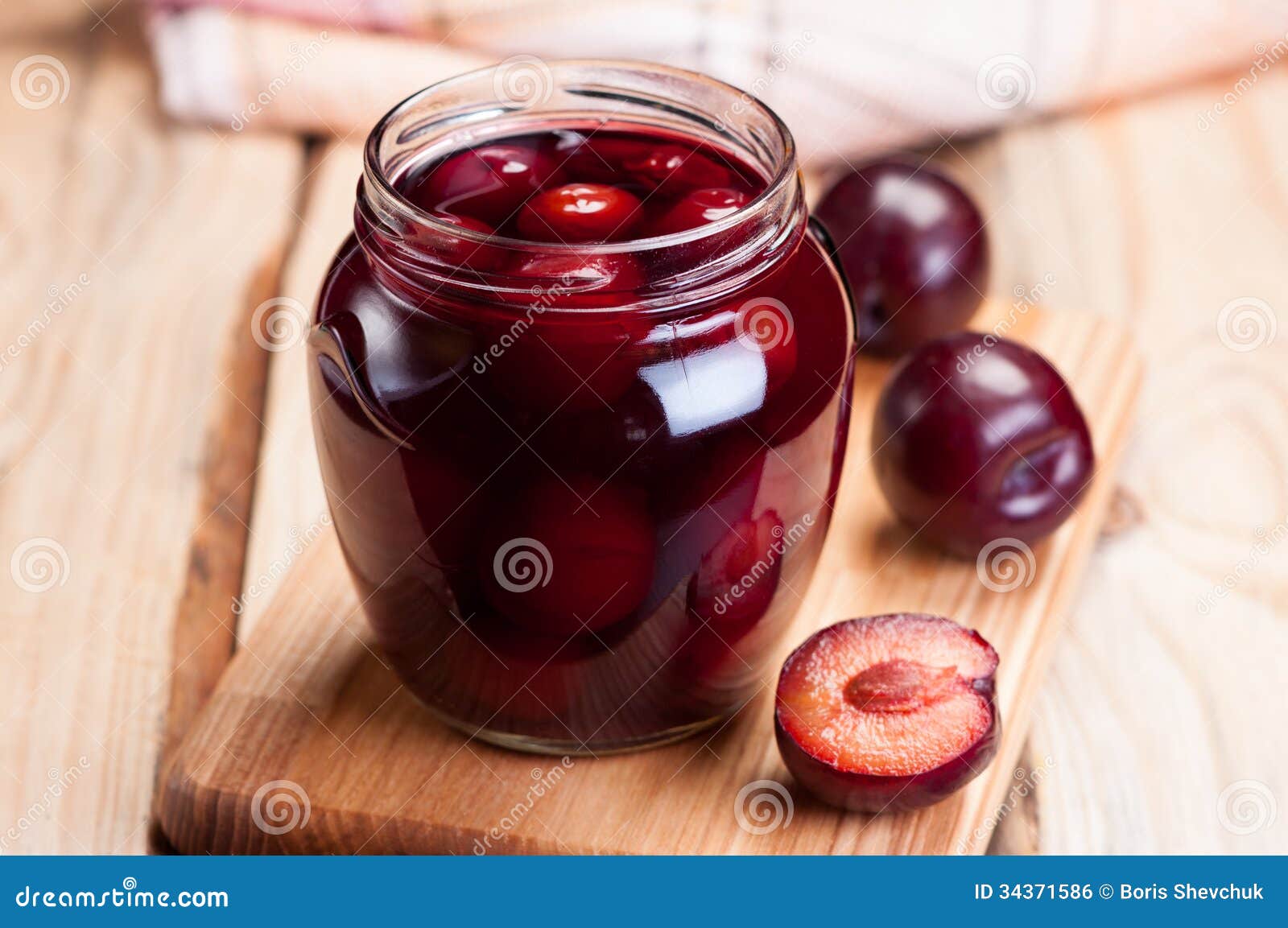 plum compote in a glass jar.