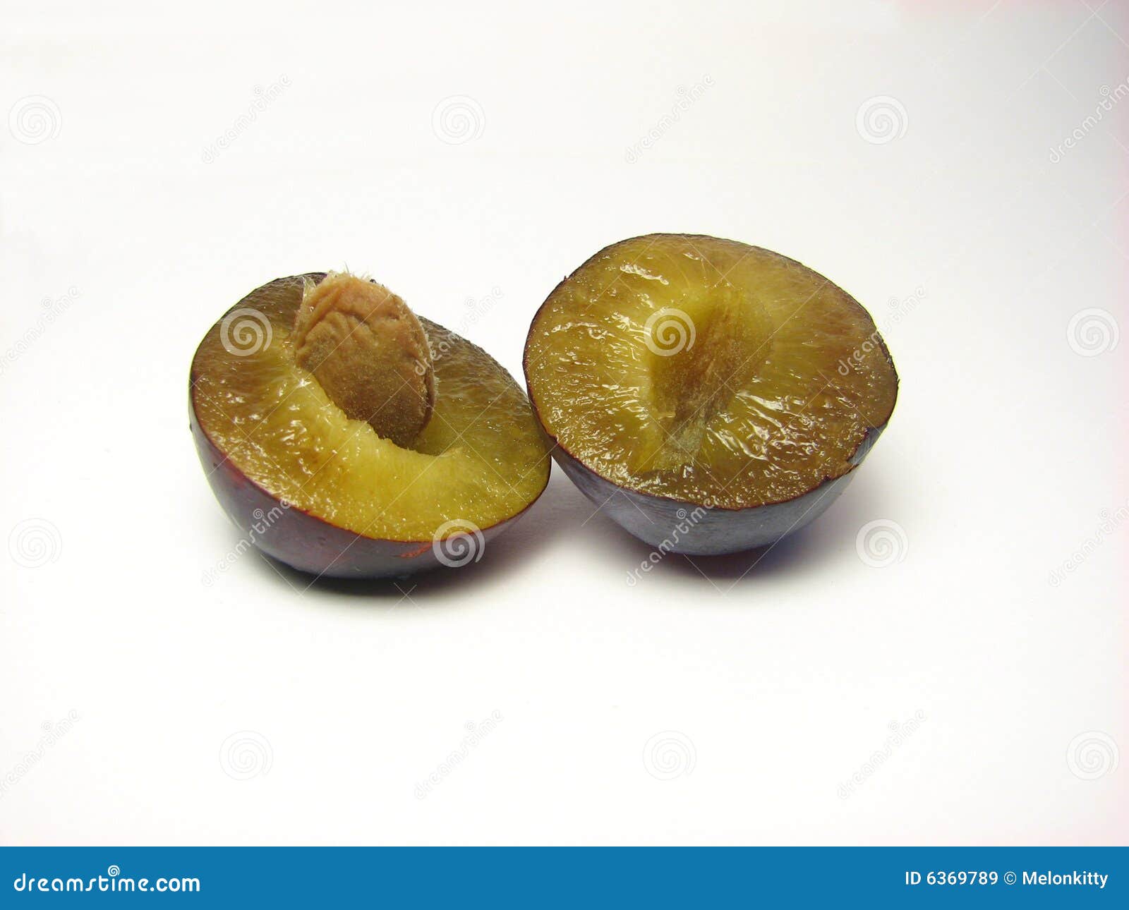 Plum cut in half stock image. Image of juicy, nature, food 6369789