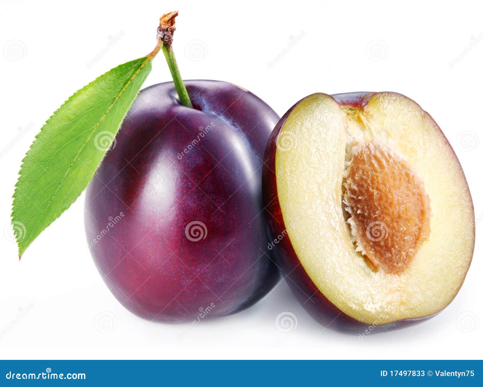 plum with a slice and leaf