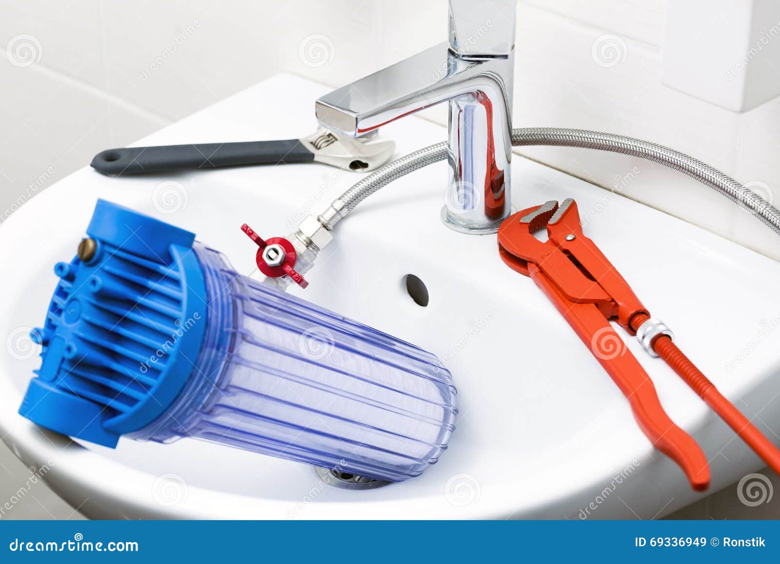 plumber equipment and water filter in the sink