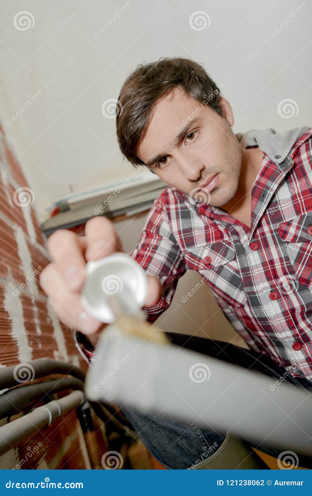 Plumber gluing a pipe stock photo. Image of sink, hydrant 121238062