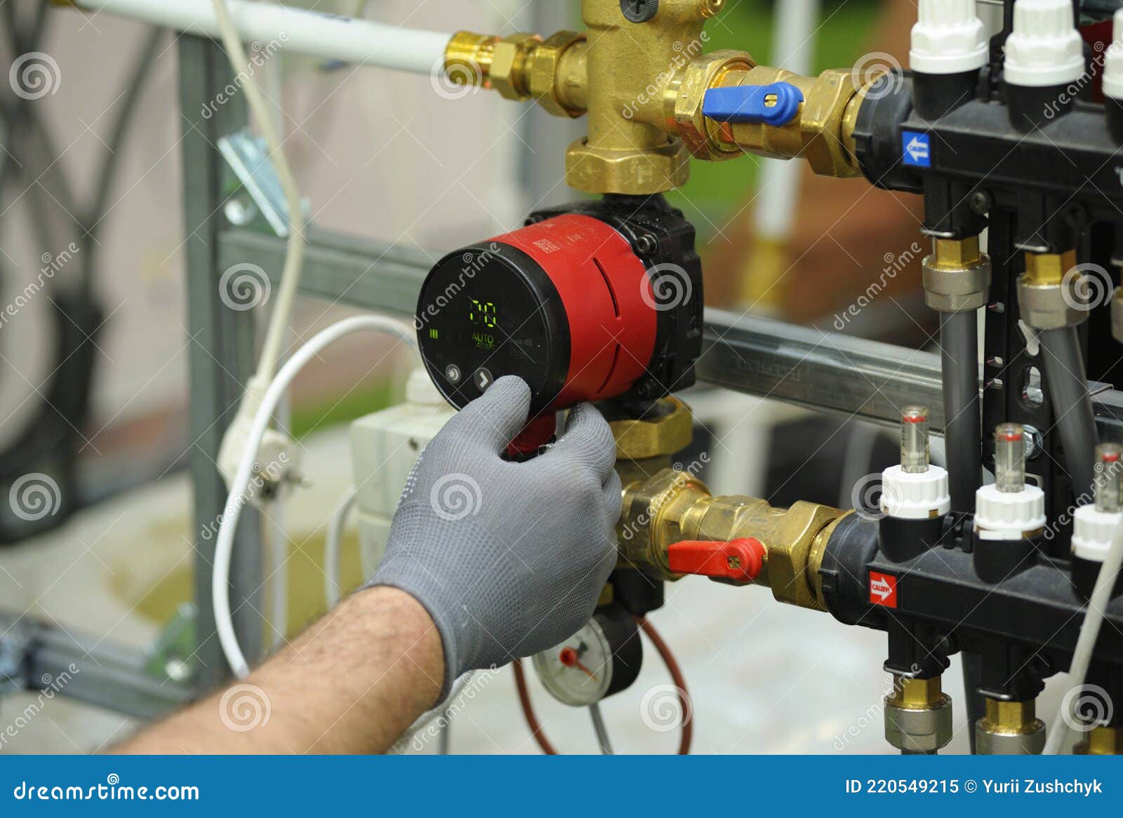 Plumber Hand in Glove Touching the Screen of the Boiler Pump Stock Image Image of join