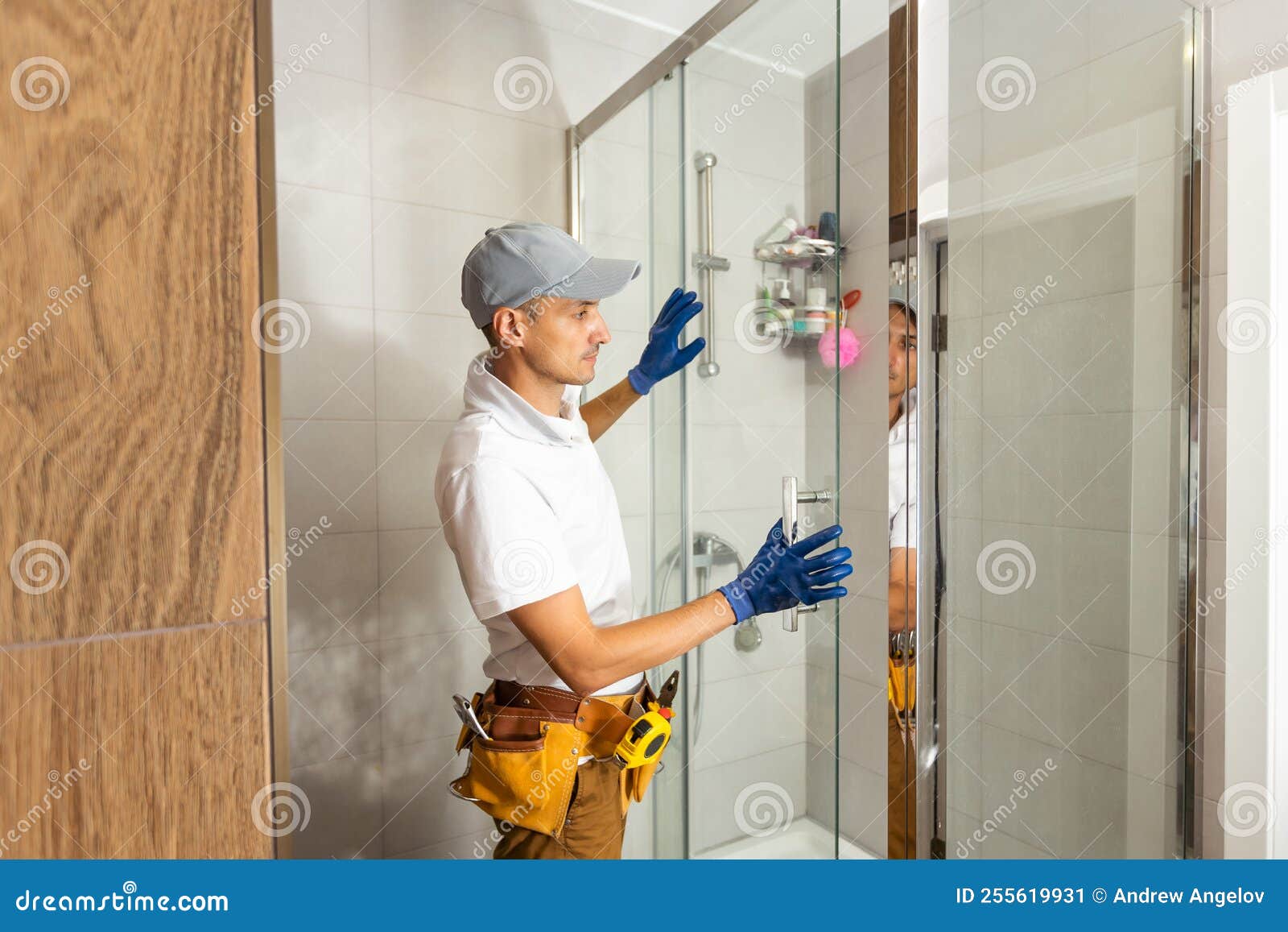 Plumber Installing Shower Stall, Work in Bathroom. Stock Image Image