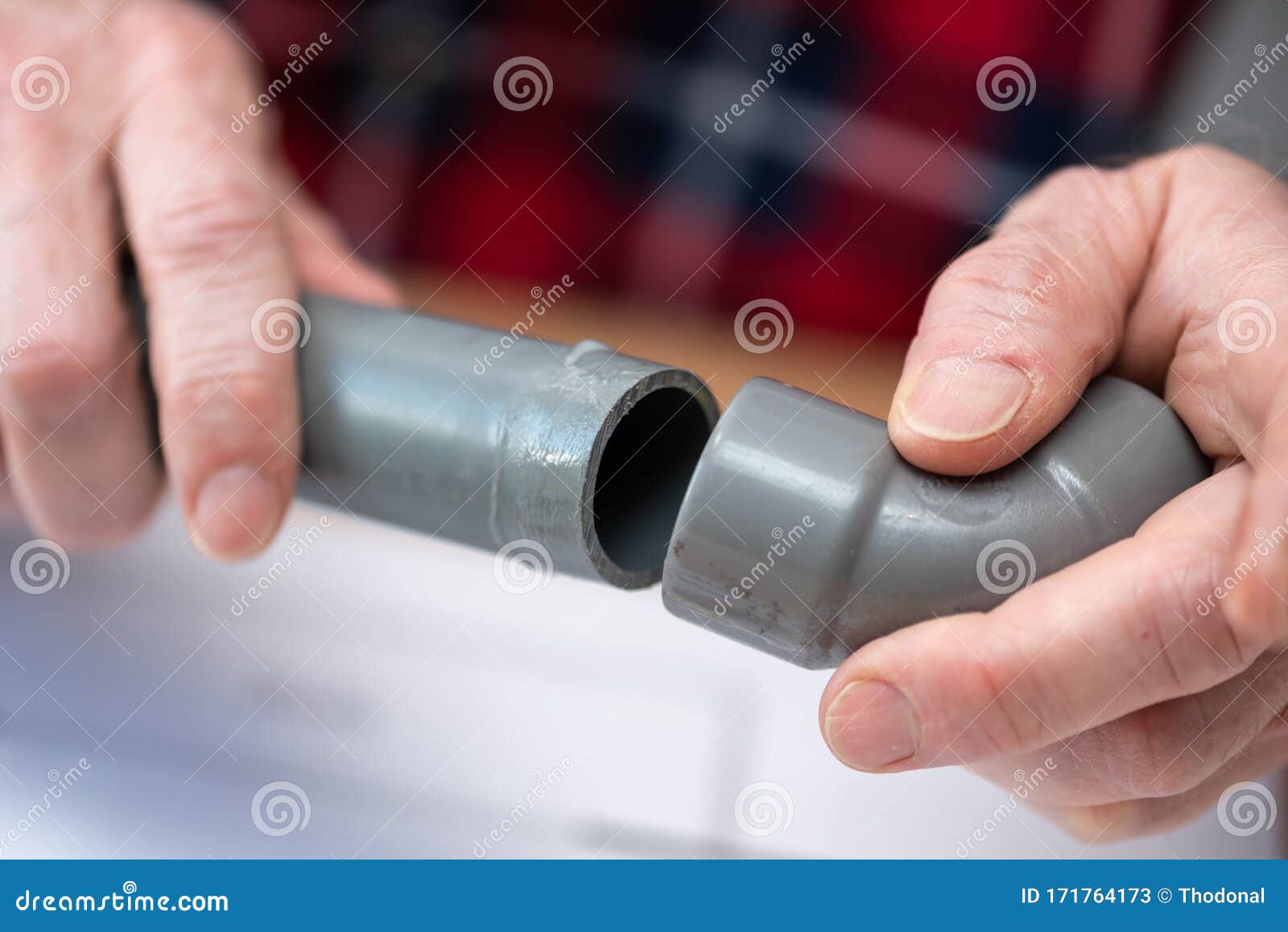 Plumber joining pvc pipes stock image. Image of plumber 171764173