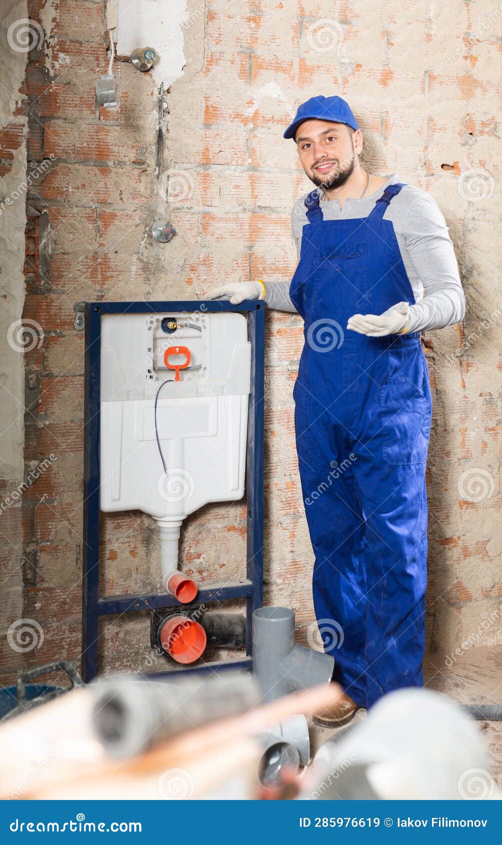 Plumber Near Mounted on Wall Toilet System Stock Image Image of