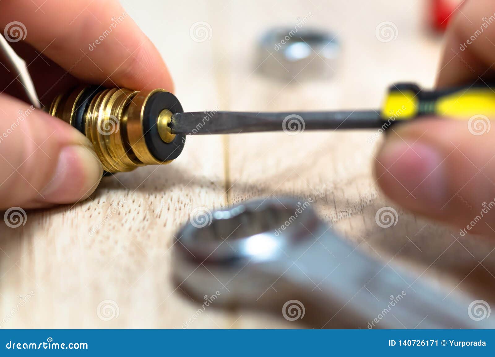 Plumber Putting a Gasket on a Plumbing Fitting, Close Up Stock Image