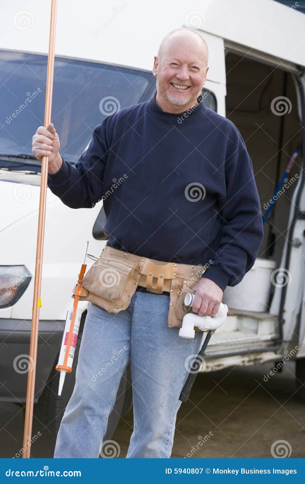 Plumber standing with van stock image. Image of middle 5940807