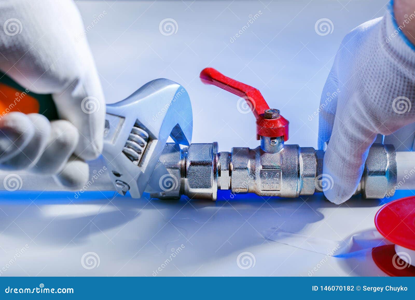 Plumber at Work with Tools Plumbing. Repair Concept Stock Photo Image