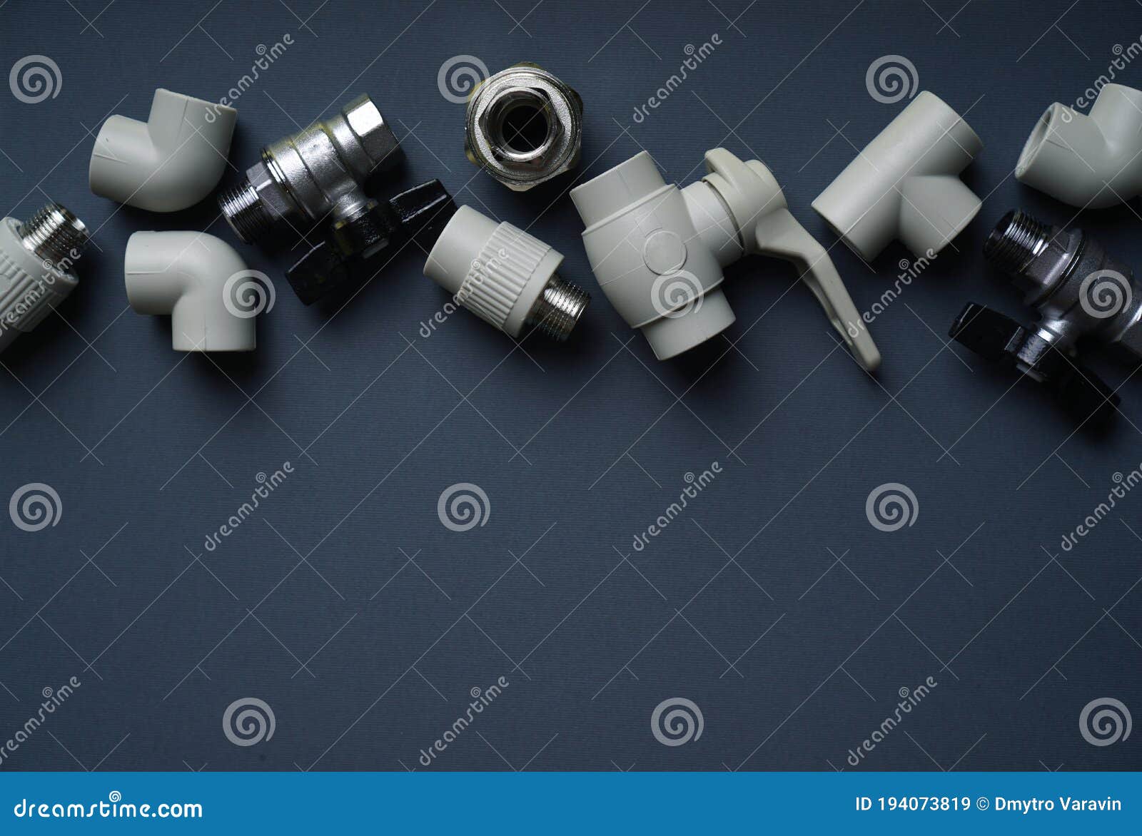 Plumbing Background with Fittings on a Dark Background Stock Image