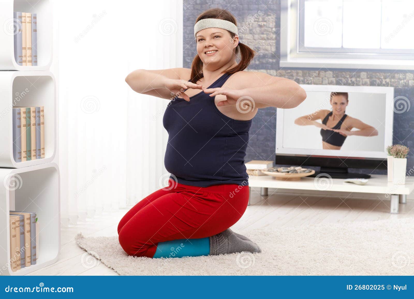 plump female doing workout at home